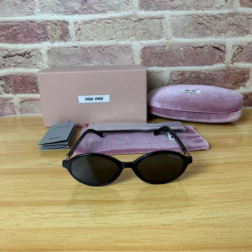 NO.551 Miu Miu black round acetate sunglasses